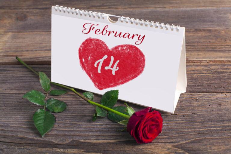 Saint Valentine calendar on rustic wooden table